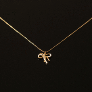 Elegant Pearl Bow Pendant Necklace – Gold-Plated Chain