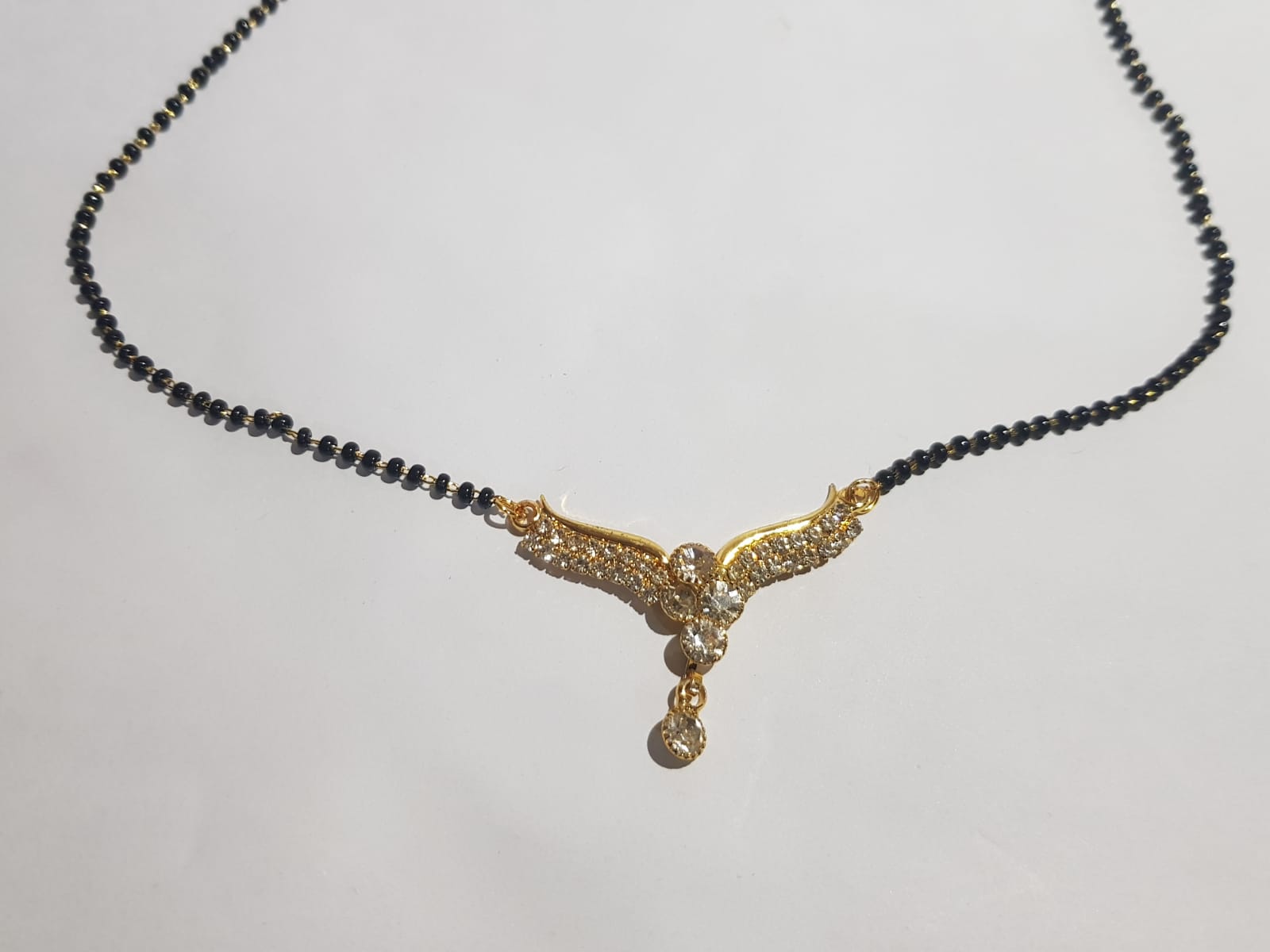 Elegant Gold-Plated Mangalsutra with Sparkling CZ Stones for Women | Daily Wear Modern Mangalsutra | Designer Black Beads Chain Necklace Copy - Image 4